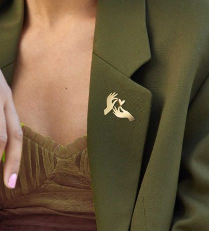 Broche dorée - Accroche-coeur